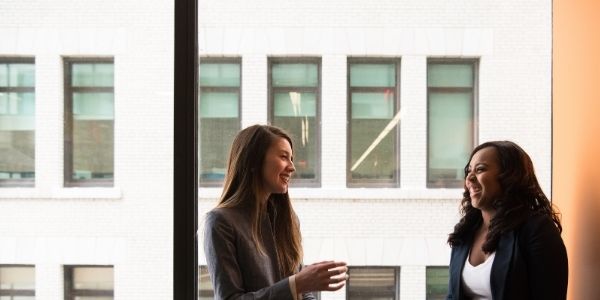 Women talking by the window