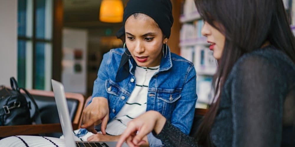 Women looking at a computer