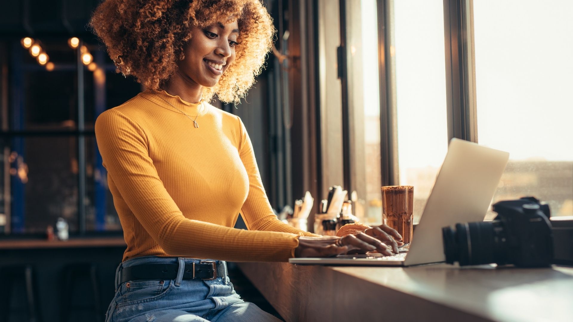Young Woman Working at Laptop