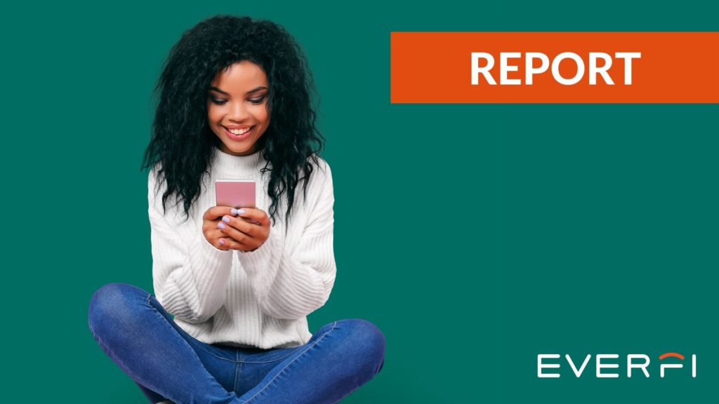 young woman smiling at phone