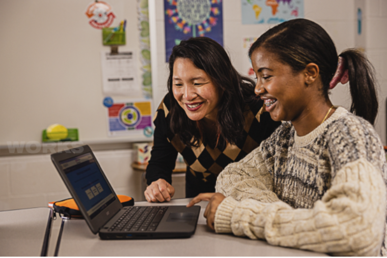 teacher and student reviewing an everfi lesson