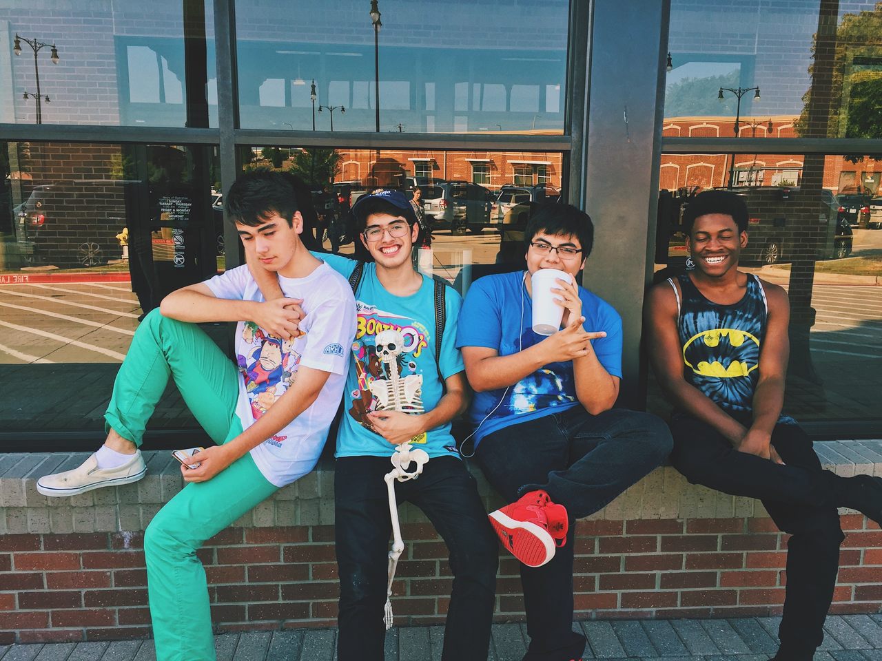 teenage boys smiling for a group picture