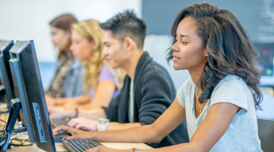 High school students on computers