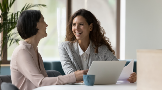 Two women working in an office