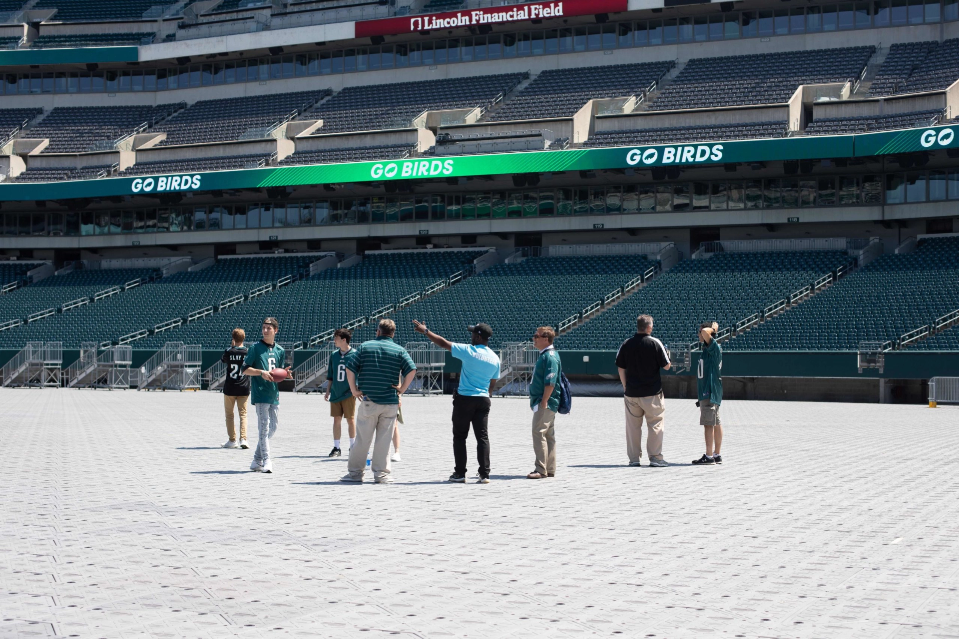 People standing in football stadium