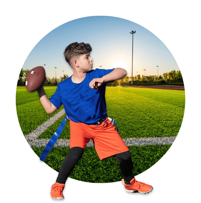child throwing football