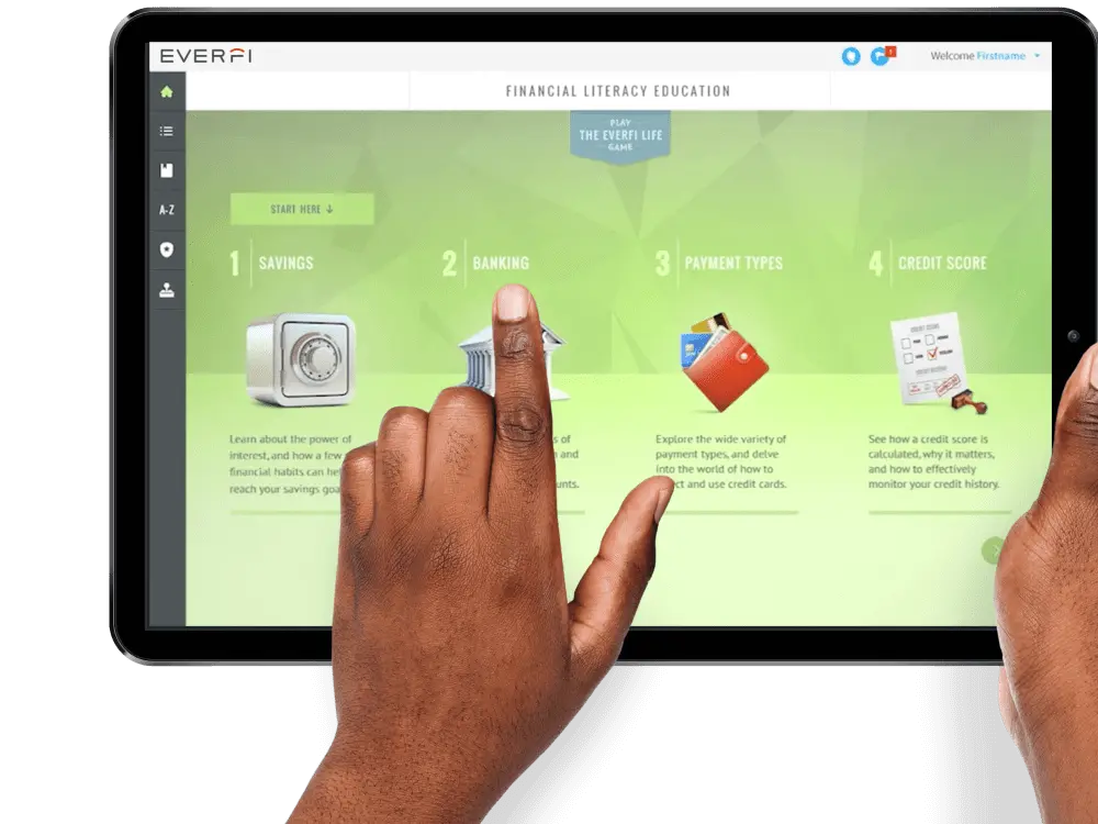 Hands using a tablet with EVERFI financial literacy modules.