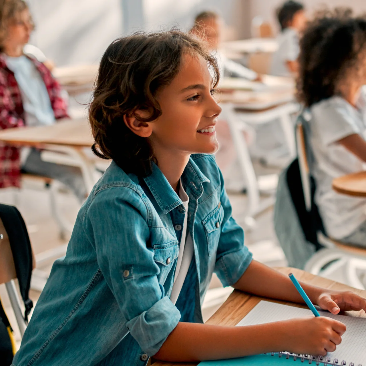 Student smiling in classroom