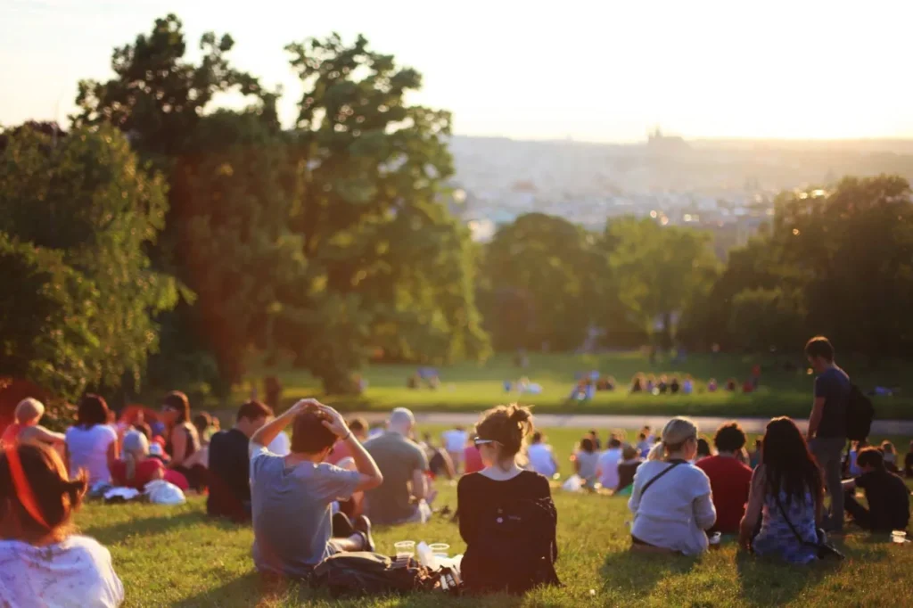 Crowd of people enjoying a park