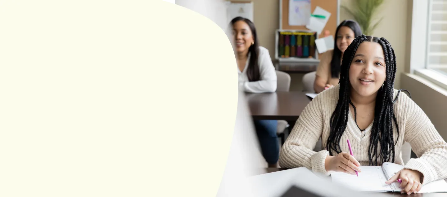 Engaged students smiling in classroom