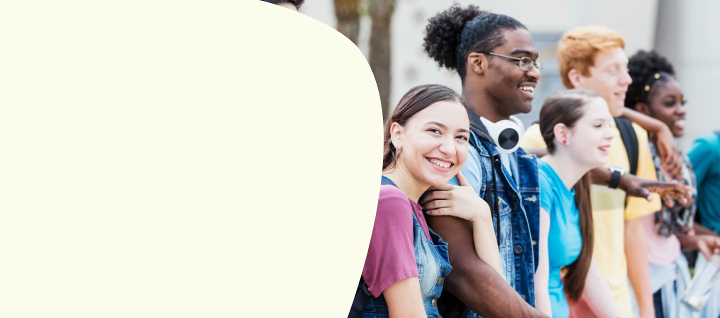 Students smiling while standing together
